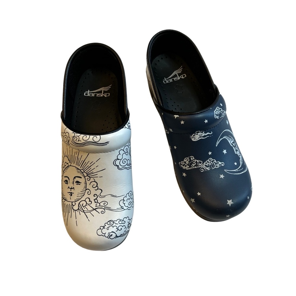 Dansko Black and White Sun and Moon Mules